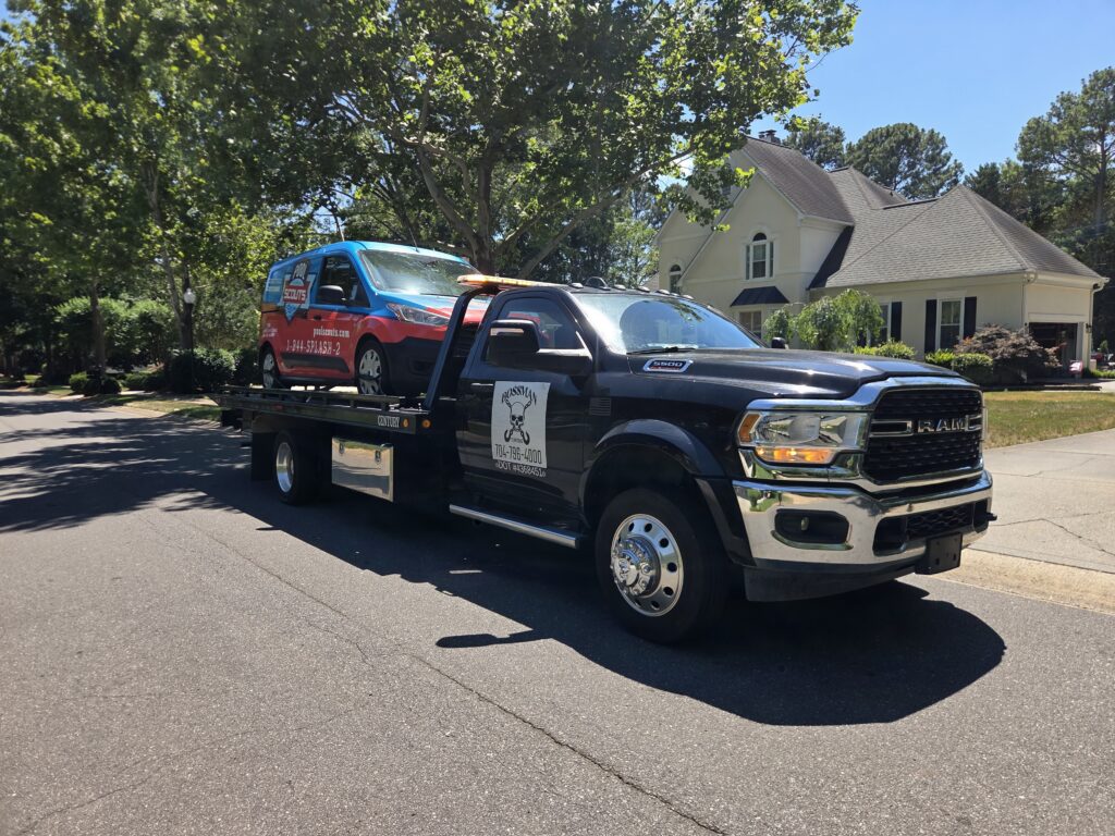 Bossman Towing truck providing towing service in Huntersville NC.